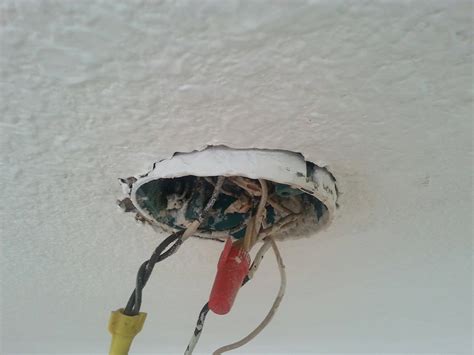 broken electrical box in ceiling|loose ceiling fan electrical box.